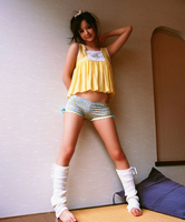 Slutty Asian Babe posing barefoot